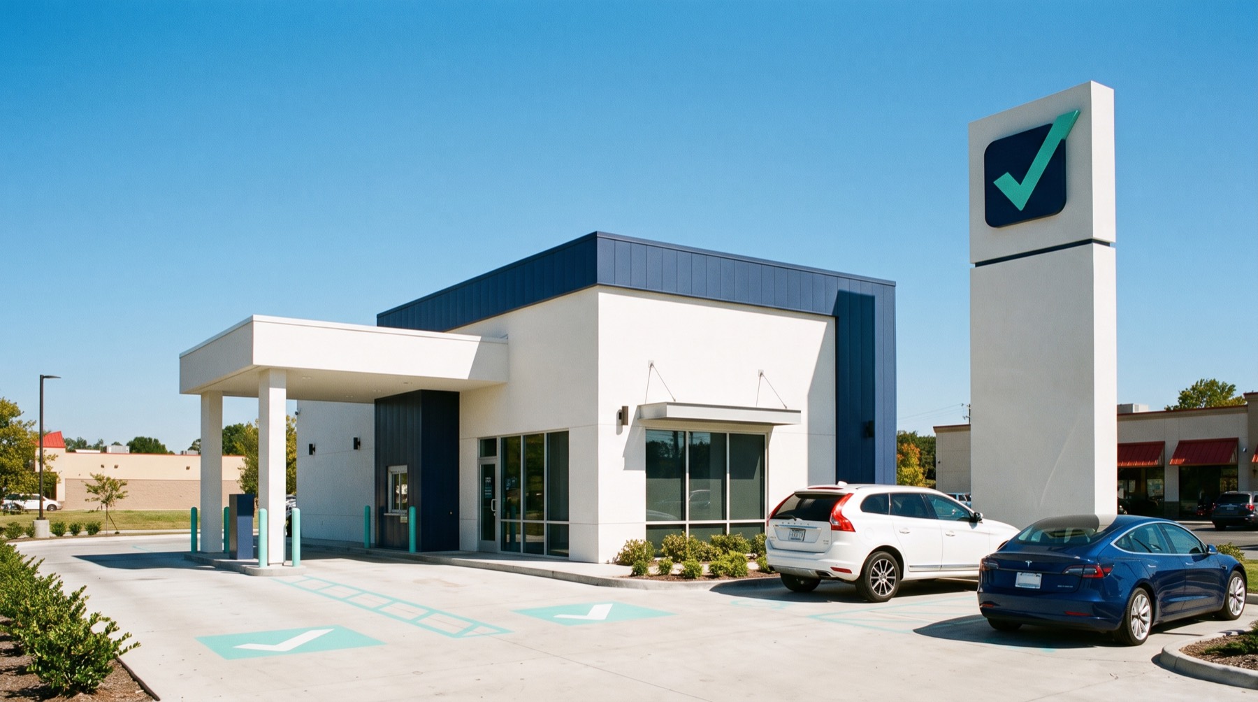 Exterior of the modern ClearPass Smog Check facility with a mint-teal checkmark sign pylon